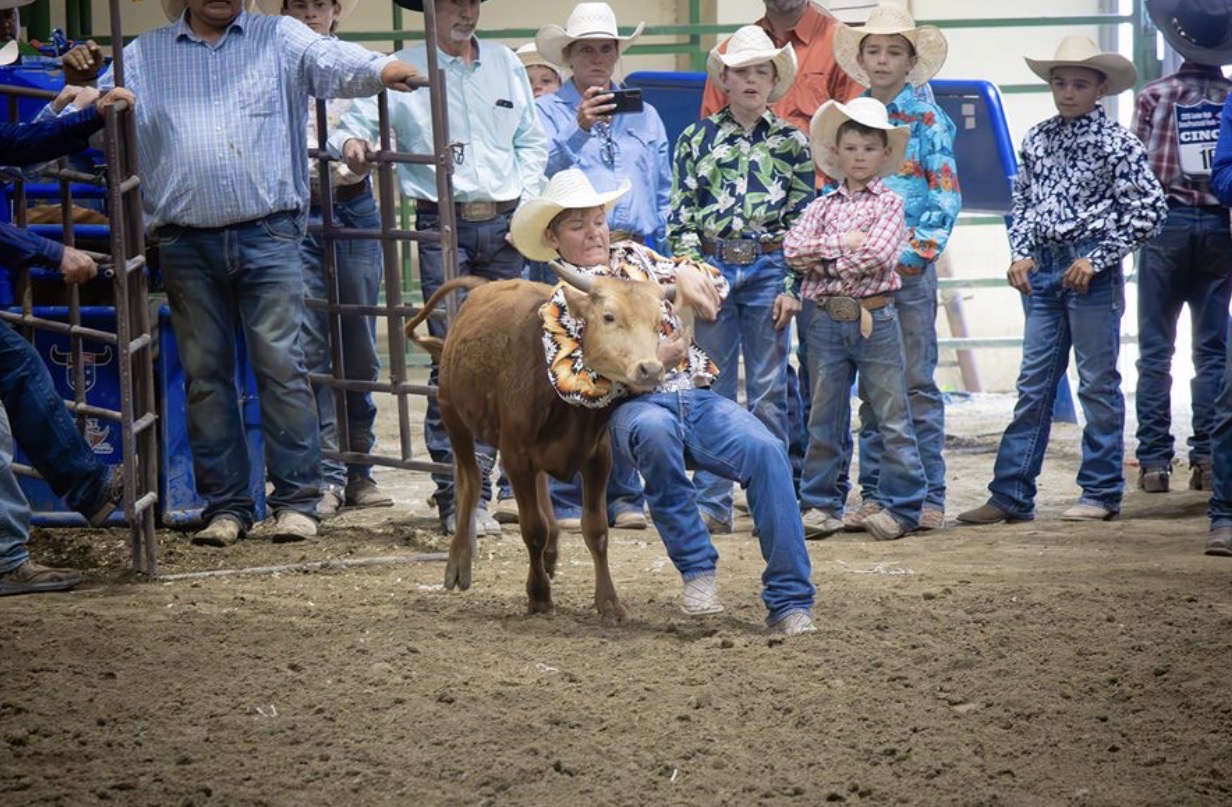 Calf roping action at an NSHSRA rodeo